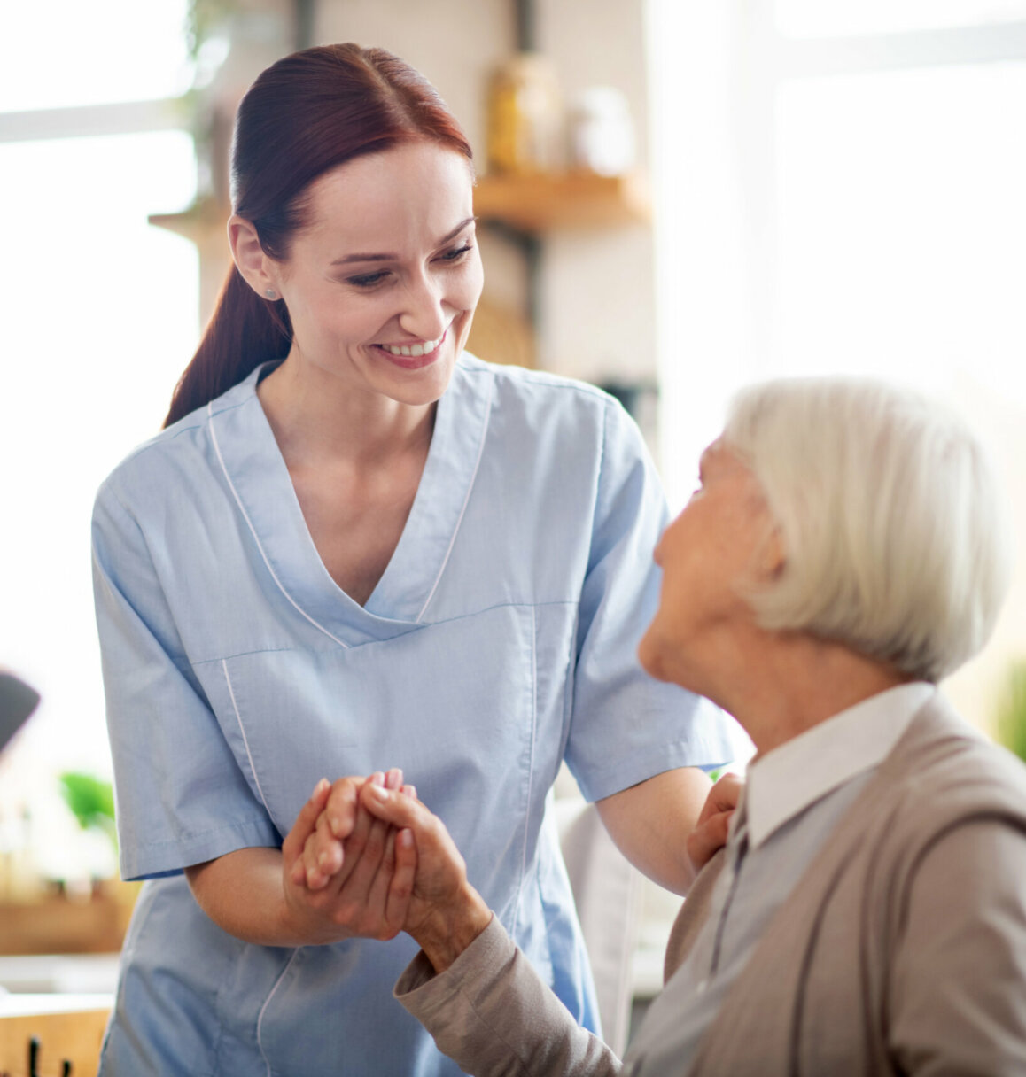 Dental assistant talking with patient following at home dental visit. - mobile